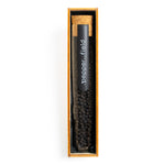 Large test tube with black Kampot pepper in a gift box